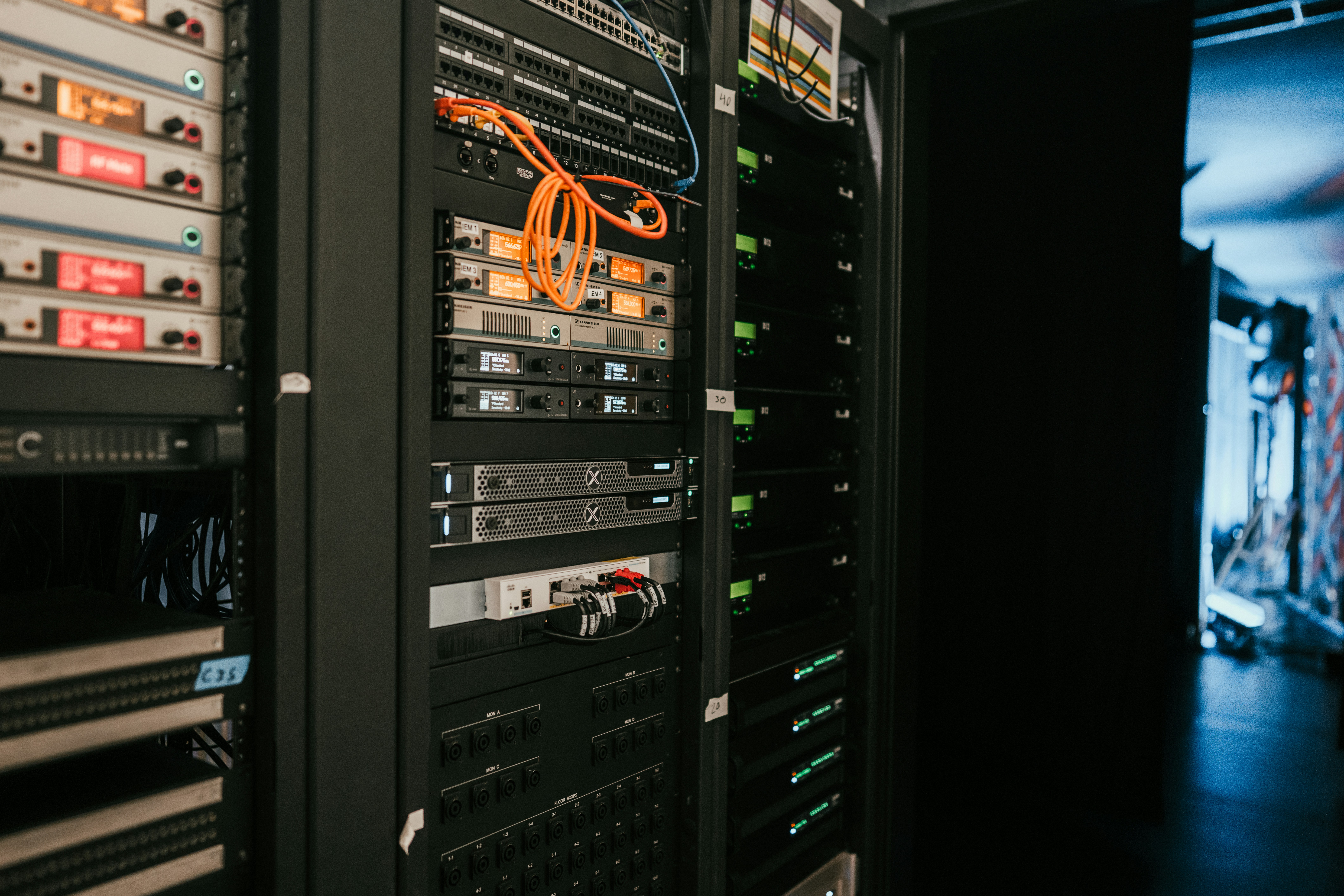 A rack of servers with patch cables